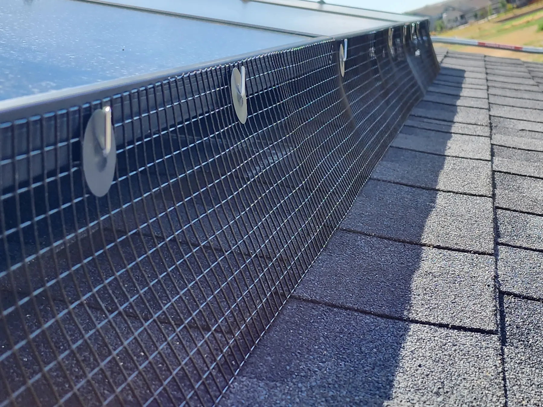 Finished residential solar critter guard installation for Christian D. in Erie, Colorado