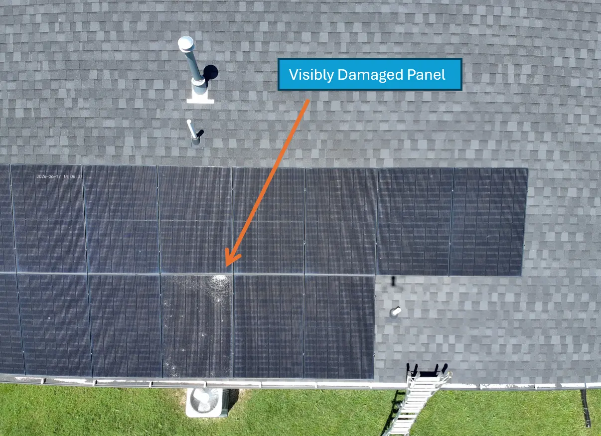 Aerial inspection view of a shingle roof with a solar array